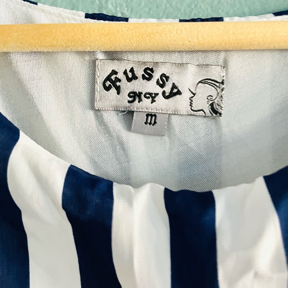 I am selling a striped blue and white dress from Fussy NY.